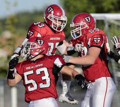 Stanely Football Players Huddle